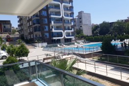 3+1 FLAT FOR SALE IN A SECURE COMPLEX WITH POOL IN ÇİĞLİ HARMANDALI